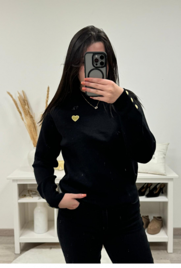 Pull noir motif...